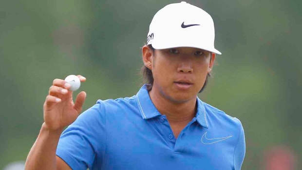 Anthony Kim waves to the gallery at the 2012 Shell Houston Open at Redstone Golf Club in Humble, Texas.